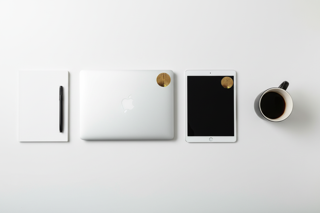 Laptop and tablet flat lay - white desk